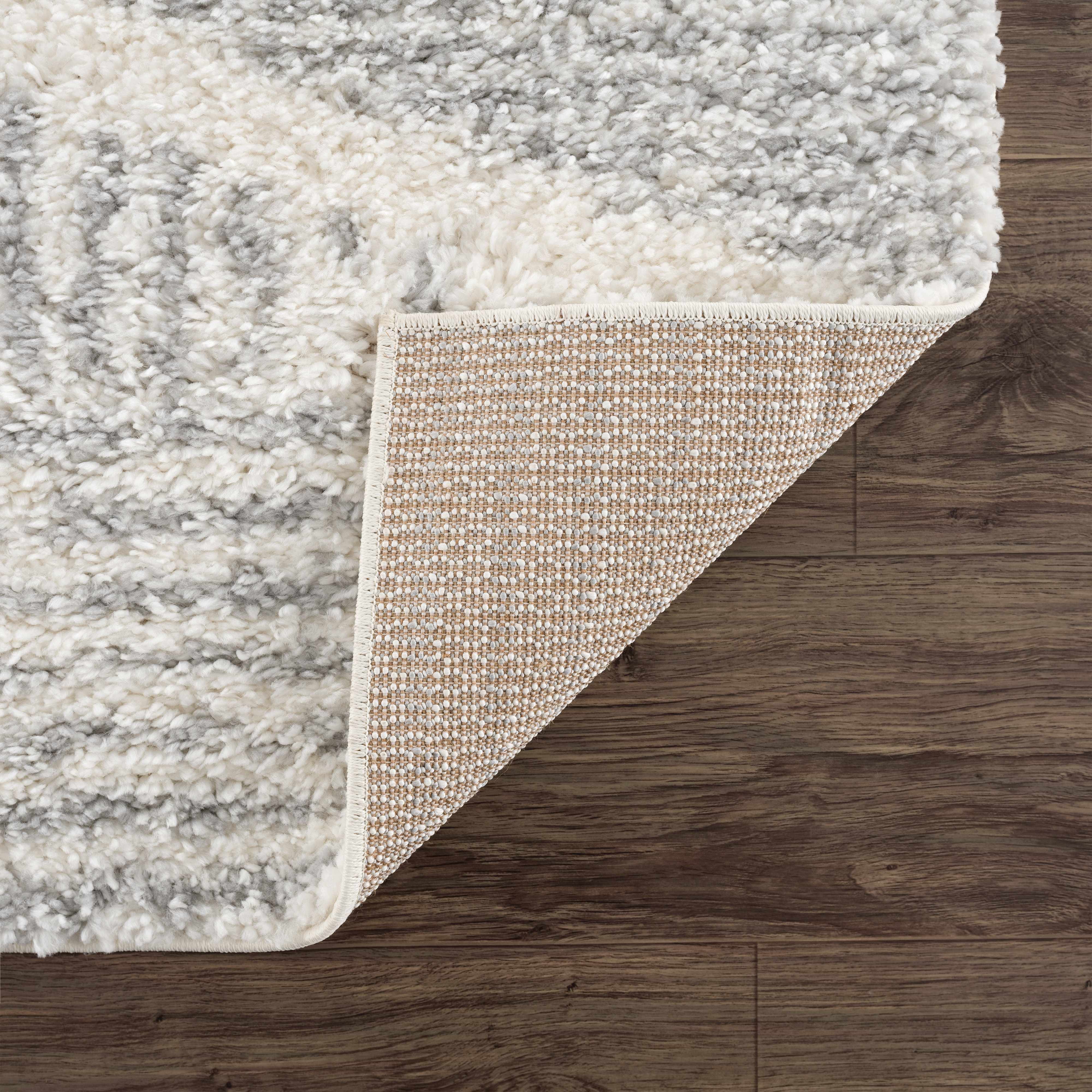 Trunding Plush Area Rug in Gray - Decor Addict, LLC