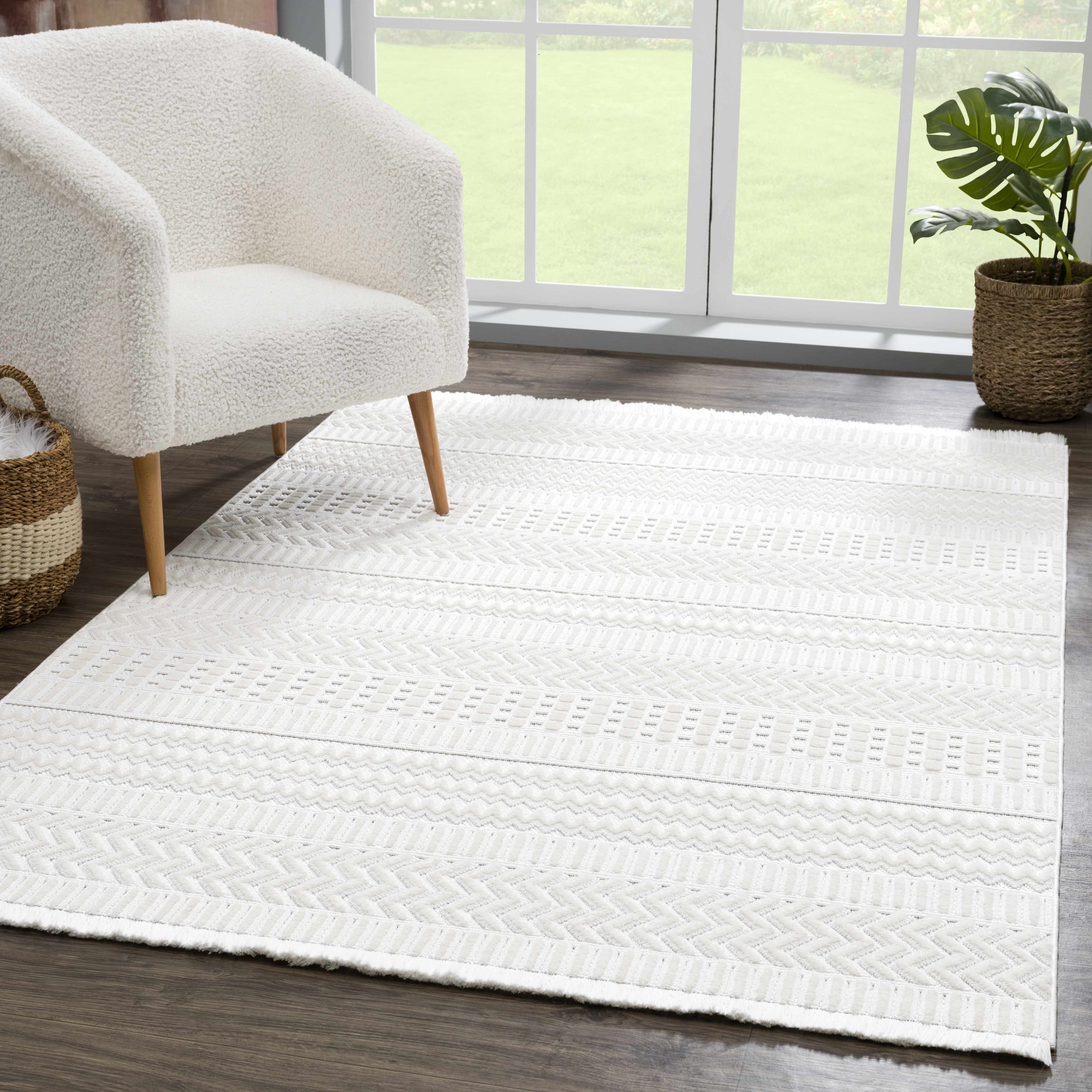 Cira Ivory Textured Area Rug with Fringes - Decor Addict, LLC