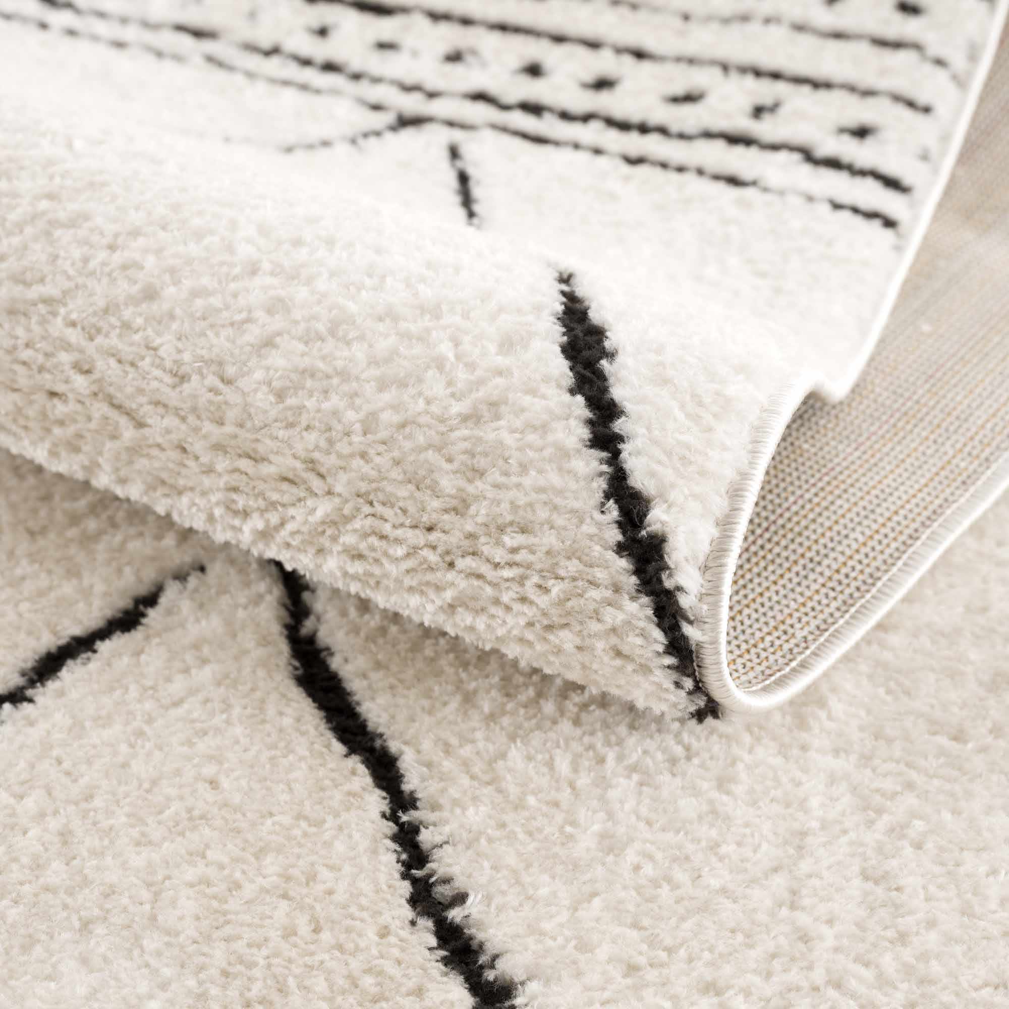 Keone Black & White Area Rug - Decor Addict, LLC