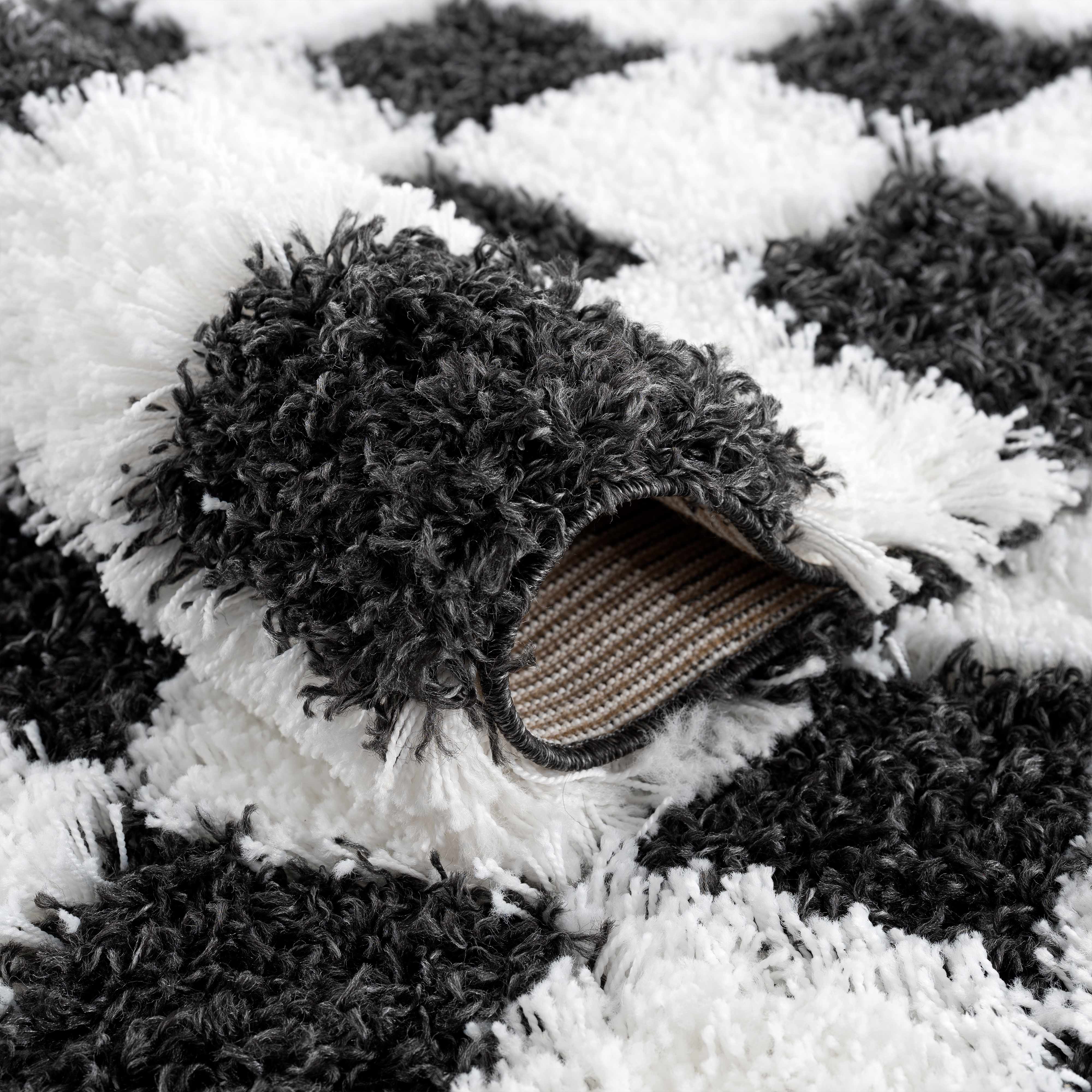 Atira Black & White Checkered Area Rug - Decor Addict, LLC