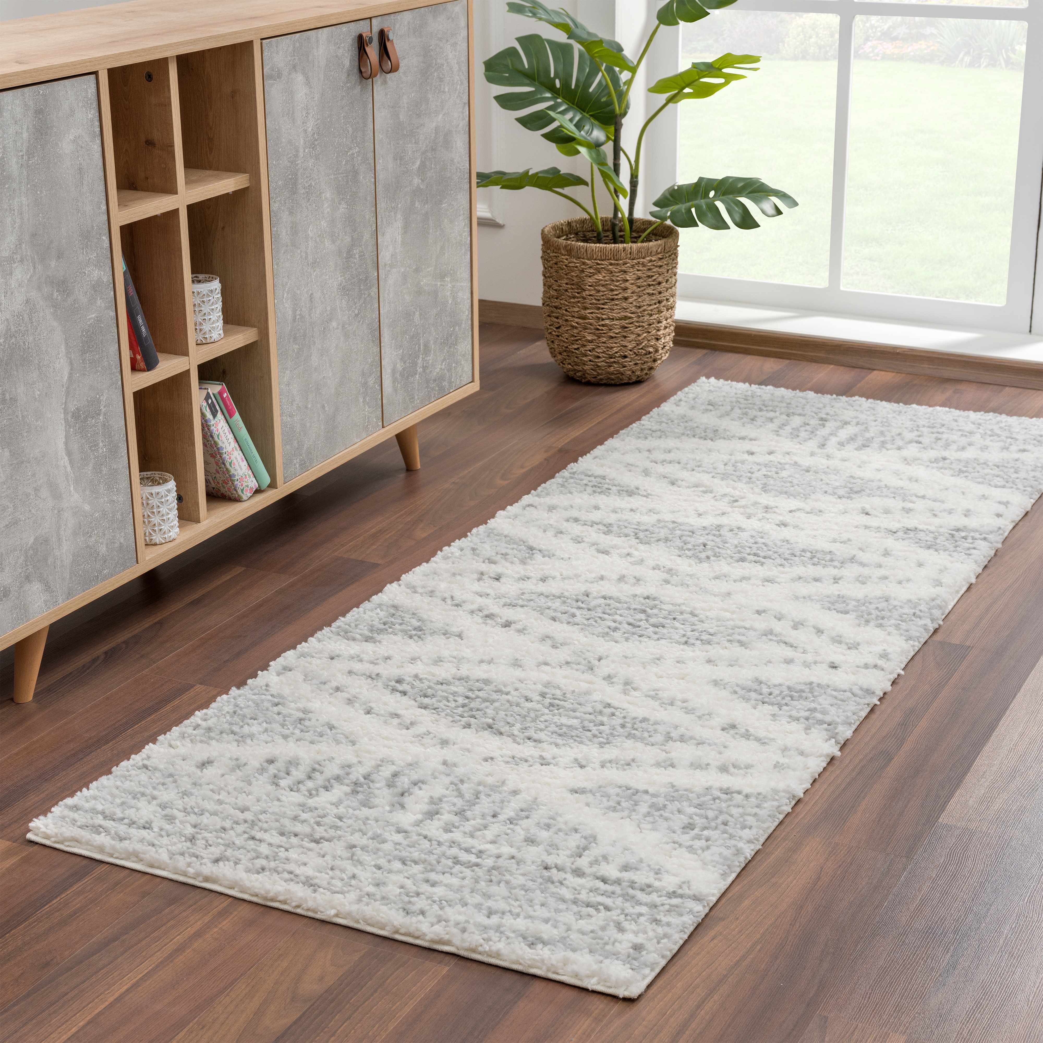 Trunding Plush Area Rug in Gray - Decor Addict, LLC