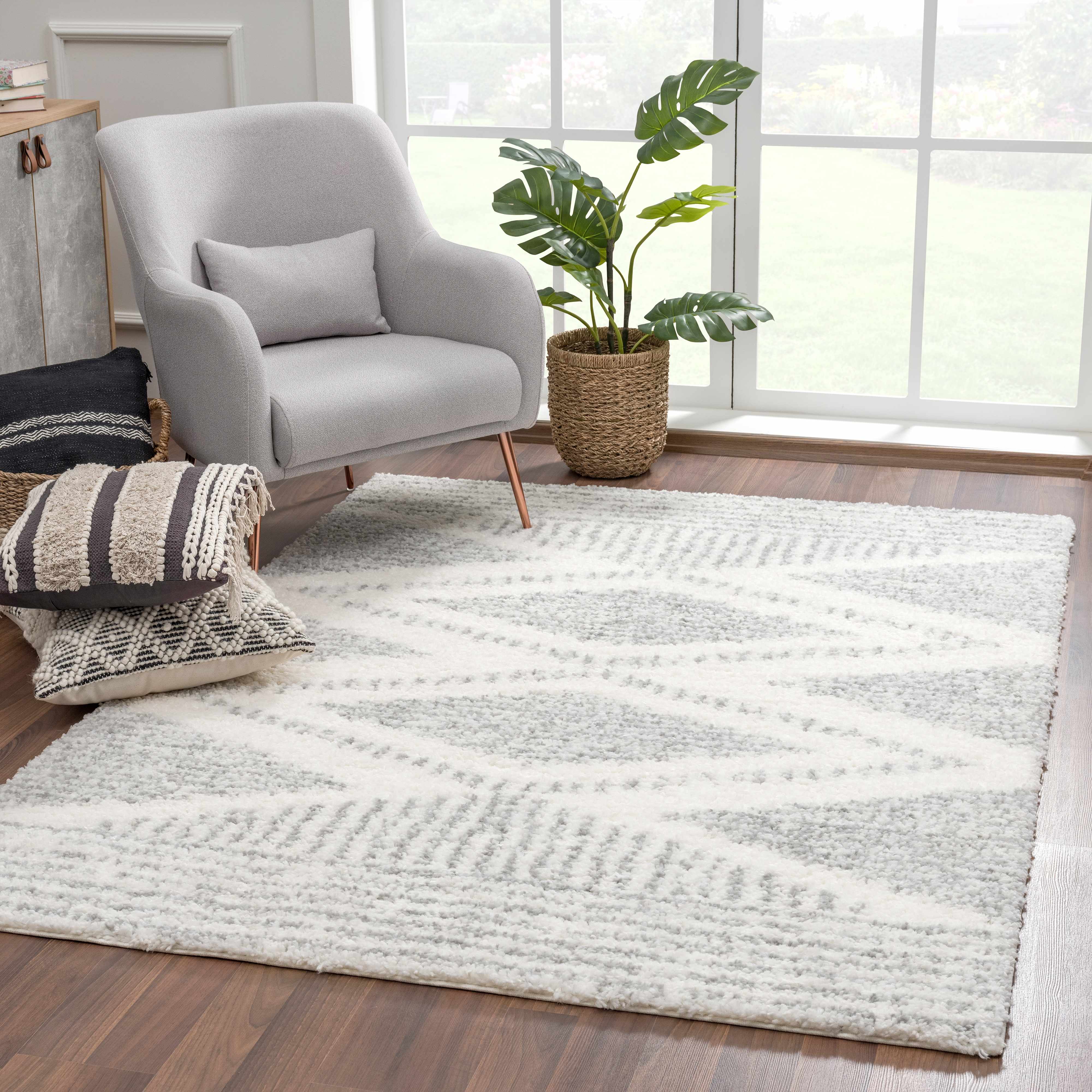 Trunding Plush Area Rug in Gray - Decor Addict, LLC