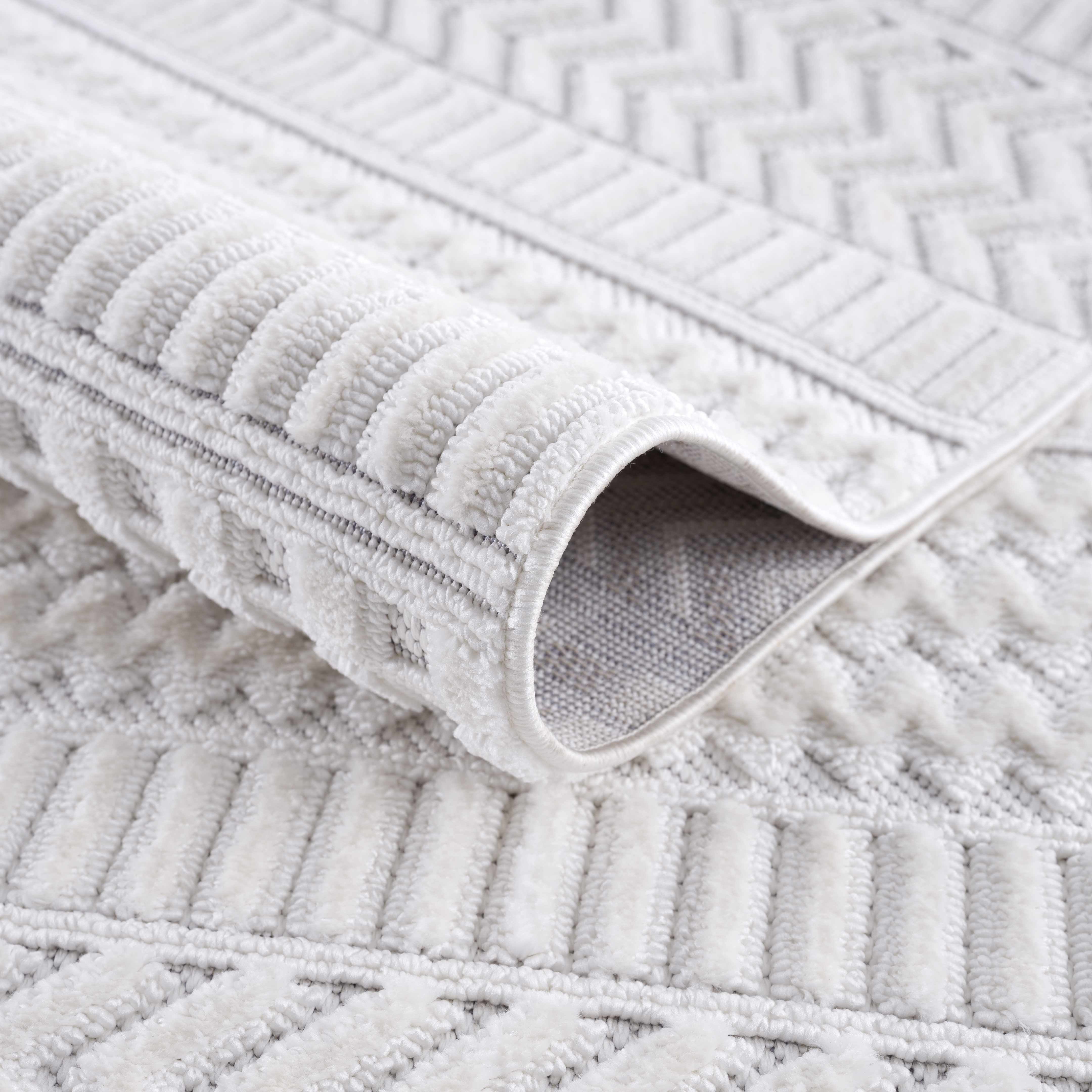 Cira Ivory Textured Area Rug with Fringes - Decor Addict, LLC