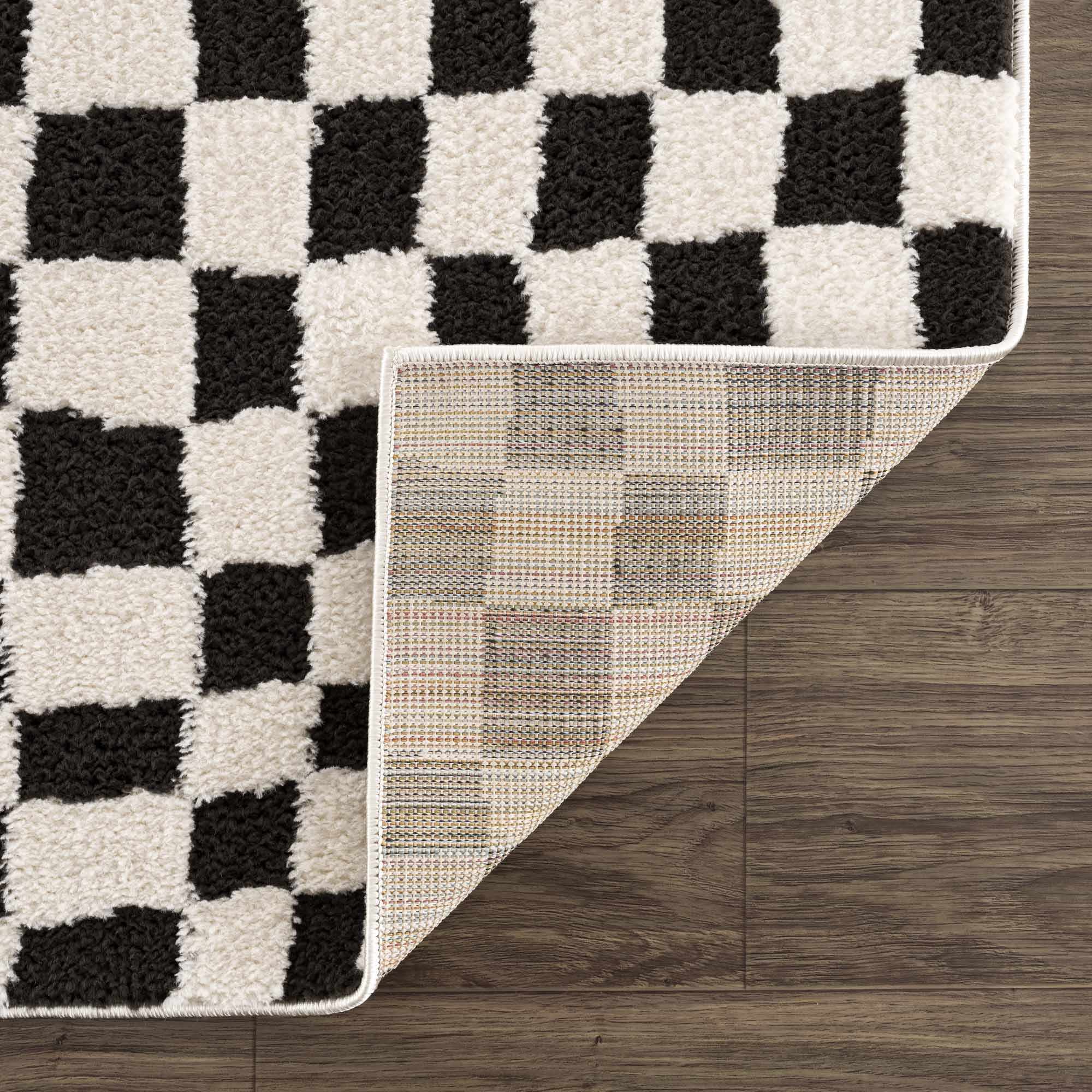 Lajos Black & White Checkered Area Rug - Decor Addict, LLC