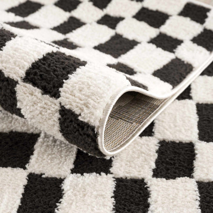 Lajos Black & White Checkered Area Rug - Decor Addict, LLC