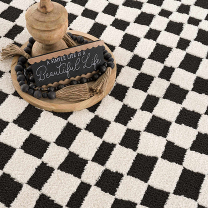 Lajos Black & White Checkered Area Rug - Decor Addict, LLC